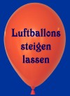 Luftballons steigen lassen